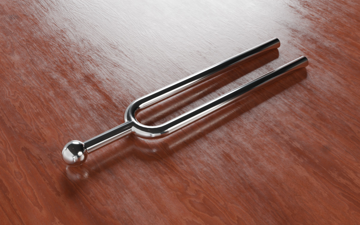 Tuning fork flat on the table