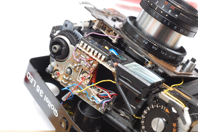 Partly dismantled camera showing circuitry