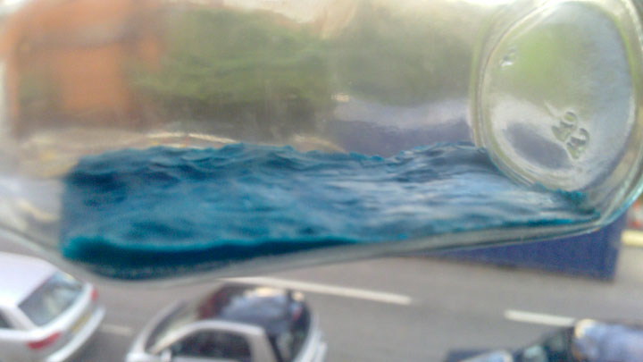Blue plasticine sea with waves