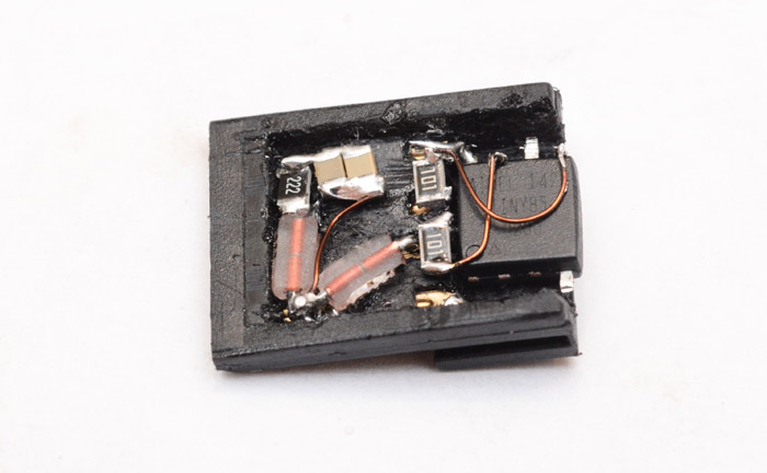 Most of the circuit fitted inside the hollowed out plastic