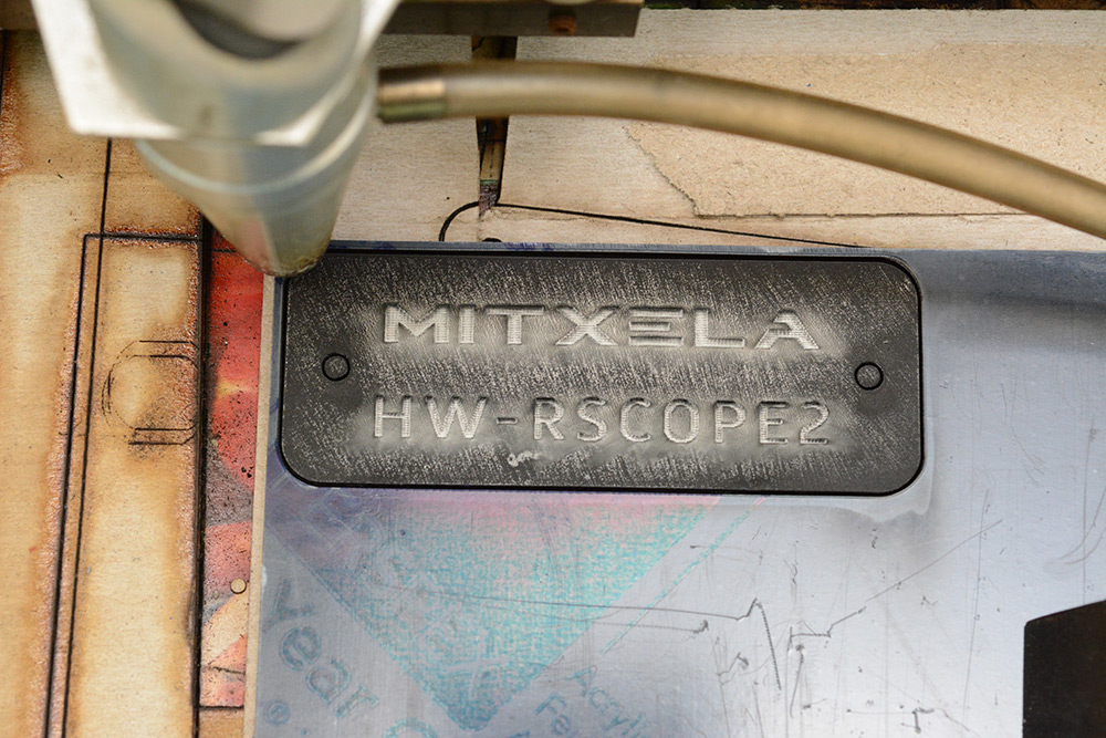 Etching a mitxela logo into some acrylic