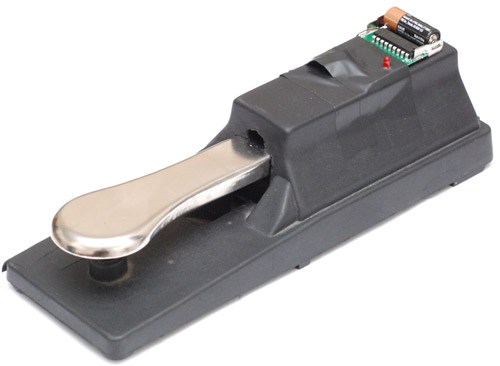 Assembled sustain pedal with battery and LED visible