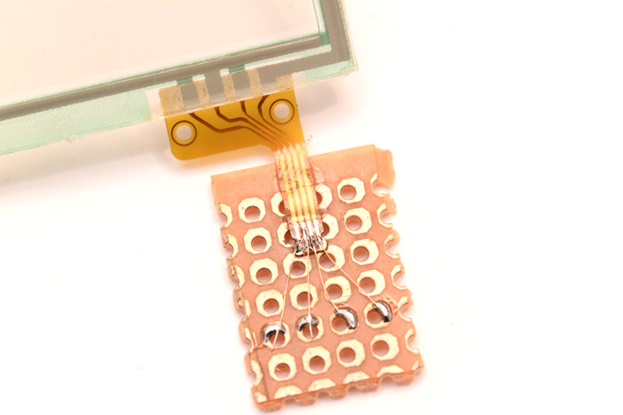 Closeup of soldering to the flat flex connector