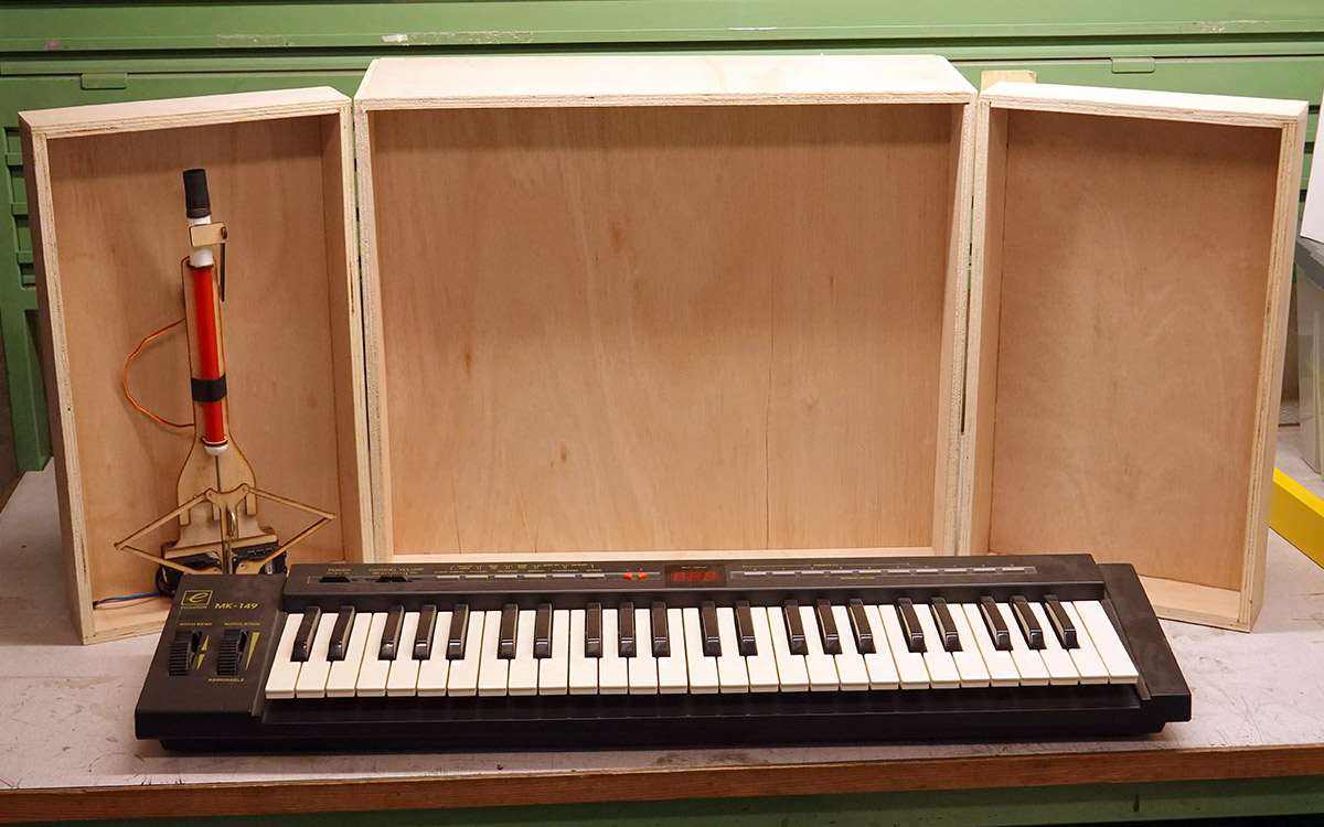 First plywood mockup, with piano keyboard in front