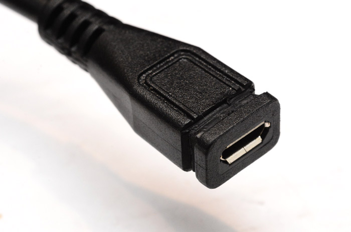 Micro-USB extension with material removed around the perimeter of the socket
