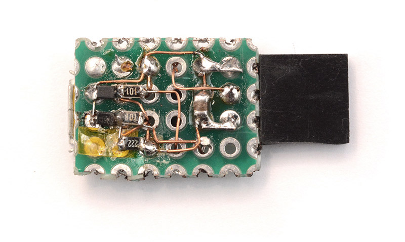 Underside of the prototype with SMD parts and enamel wire