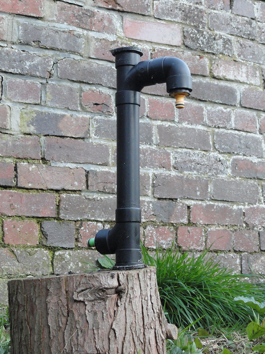 PVC hand pump, missing the handle