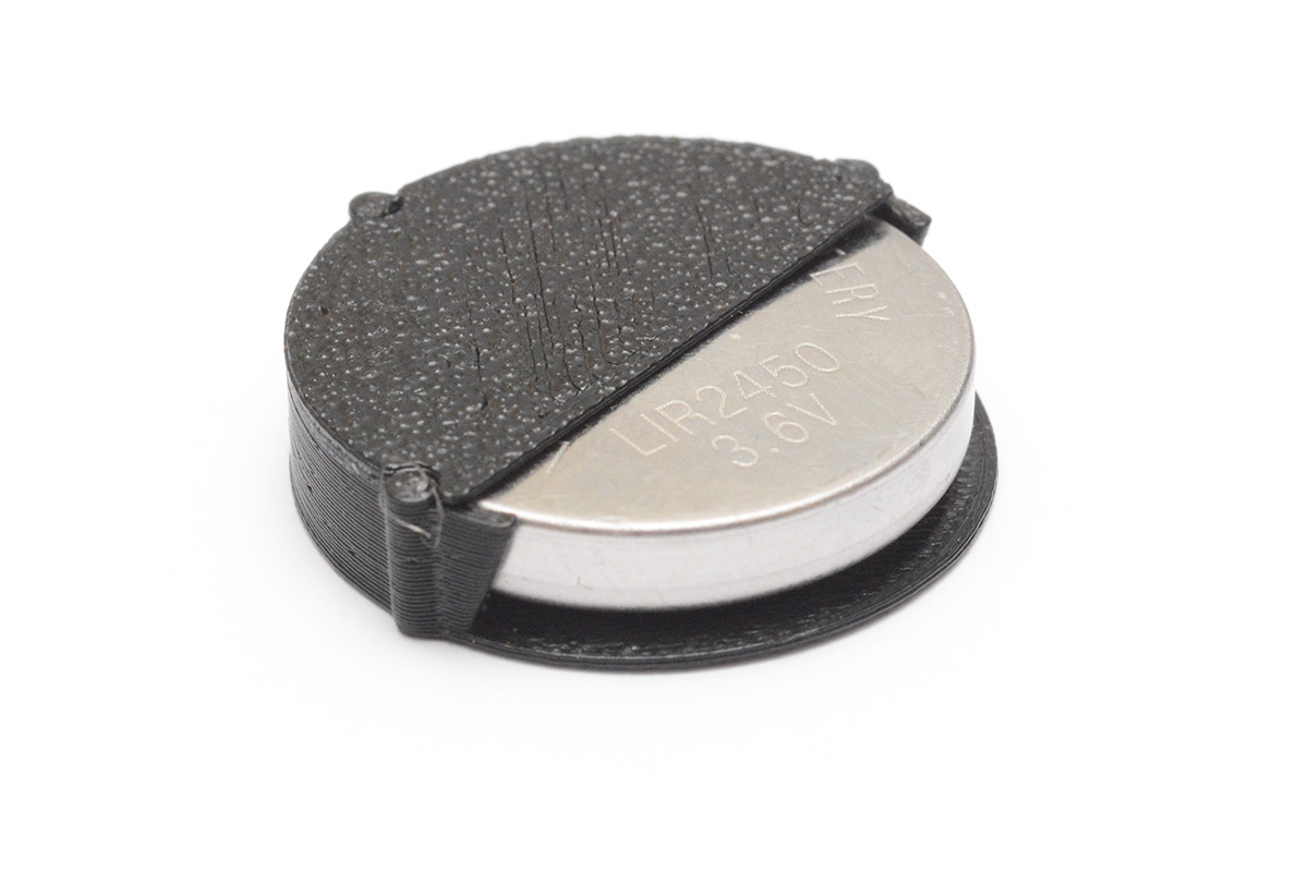 Tiny holder for a LIR2450 battery